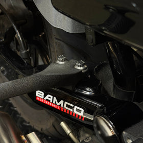 Close-up of BAMCO ARP stainless bolts installed on a Harley-Davidson 06-17 Dyna, 06-17 Dyna Passenger Peg ARP Kit