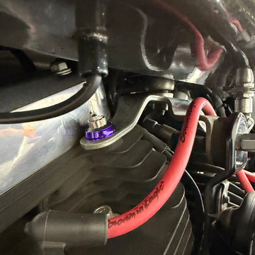Close-up of BAMCO ARP stainless bolts installed on a Harley-Davidson 06-17 Dyna, 06-17 Dyna Mid Motor Mount ARP Kit