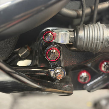 Close-up of BAMCO ARP stainless bolts installed on a Harley-Davidson M8 Softail, M8 Softail Rear Brake Reservoir Pin/Bolt Kit