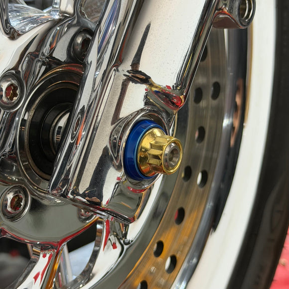 Close-up of BAMCO ARP stainless bolts installed on a Harley-Davidson 39mm, 39mm Front Axle ARP Nut Kit