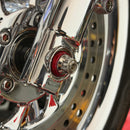 Close-up of BAMCO ARP stainless bolts installed on a Harley-Davidson 39mm, 39mm Front Axle ARP Nut Kit