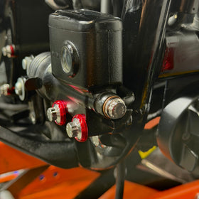 Close-up of BAMCO ARP stainless bolts installed on a Harley-Davidson M8 Softail, M8 Softail ARP Banjo Bolts