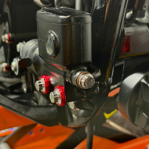 Close-up of BAMCO ARP stainless bolts installed on a Harley-Davidson M8 Softail, M8 Softail ARP Banjo Bolts