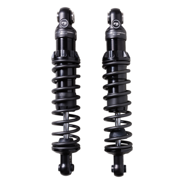 Pair of FOX IFP V‑Twin Street Performance rear shocks with matte black coil springs for Harley Sportster.