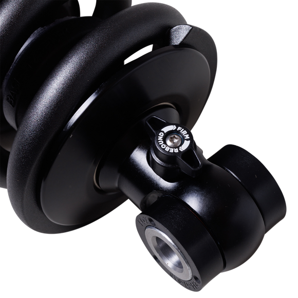 Close-up of FOX IFP-QSR rear shock for Harley Softail MY20+ showing coil spring, rebound knob and mounting eye