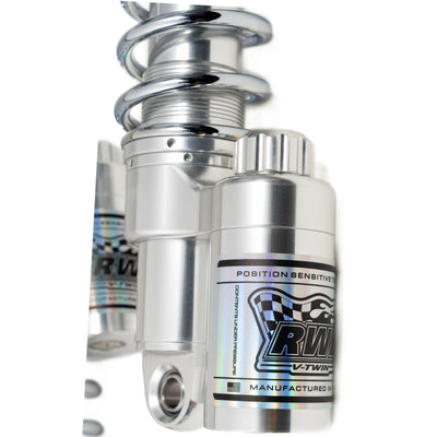 Close-up of RWD RS-2 polished Touring shock with chrome spring and billet piggyback reservoir