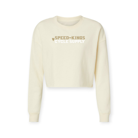 Bone color women's moto sweatshirt with 'Speed-Kings Cycle Supply' text and heart logo on a white background