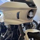 Close-up of a Low Rider ST motorcycle's Baja lp4 front headlight and light bar aux light