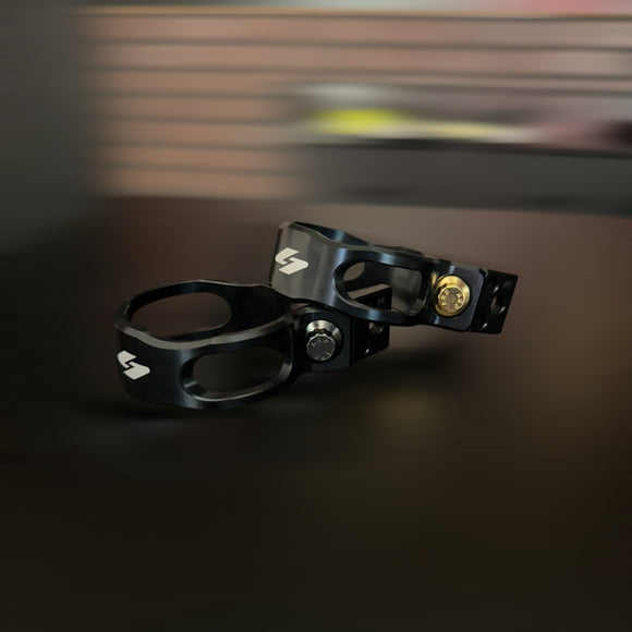 BAMCO Harley-Davidson reservoir mounts with ARP stainless-steel bolts — black anodized clamps with gold and black-plated bolts