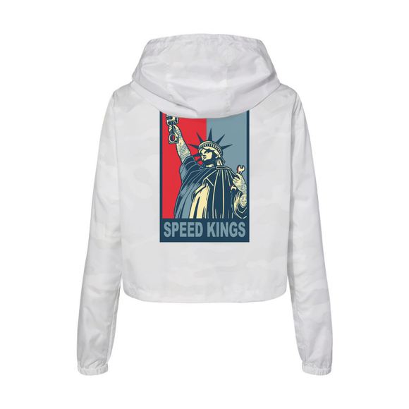 White weatherproof womens anorak jacket with a graphic of the Statue of Liberty and 'Speed Kings' text on the back, on a white background.
