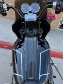 Low Rider dual-gauge relocation kit on black motorcycle tank with carbon-fiber console