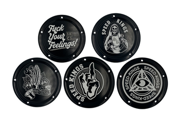 A collection of custom-designed derby covers for M8 Softail Harley Davidson Motorcycles, each with a unique black and white graphic, attached to a white background for display by Speed Kings