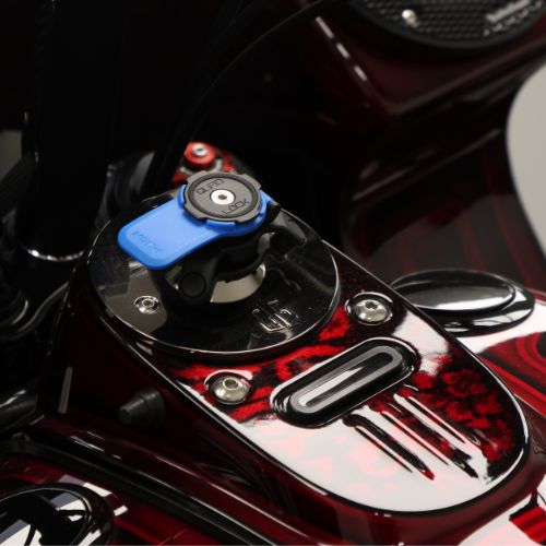 Blue Quad Lock reversible gauge block-off plate on motorcycle tank