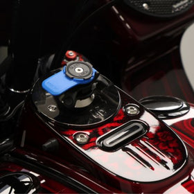 Blue Quad Lock reversible gauge block-off plate on motorcycle tank