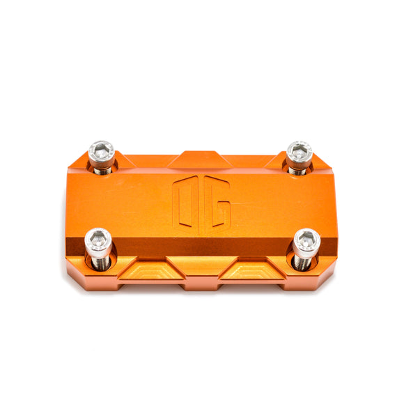 Orange anodized OG handlebar riser top clamp with four hex bolts