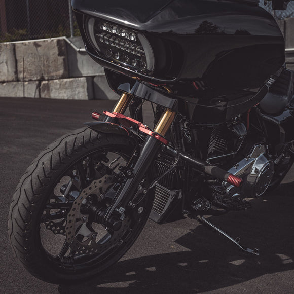 Black Road Glide motorcycle front with gold fork tubes