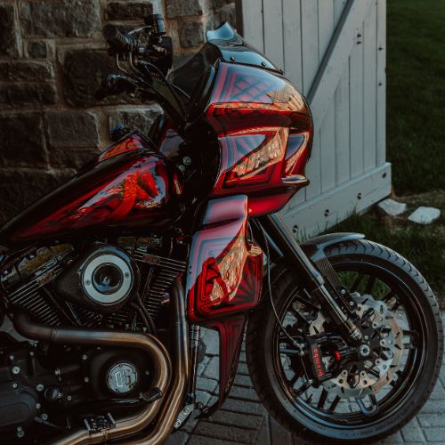 OG Twin Cam points cover chrome engine cover
Custom red motorcycle front fairing and wheel