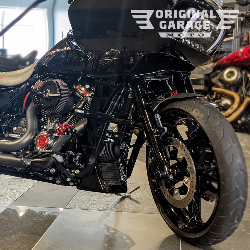 Highway peg crash bar on black Harley-Davidson bagger by Original Garage Moto