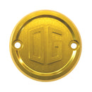Gold OG M8 motorcycle points cover with embossed OG logo, round two-screw ignition plate