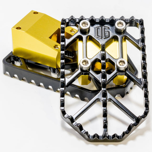 OG Moto X CNC aluminum motorcycle foot pegs, black top plate with gold anodized mounts