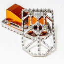 OG Moto X aluminum motorcycle foot pegs — serrated silver platform with orange anodized mount