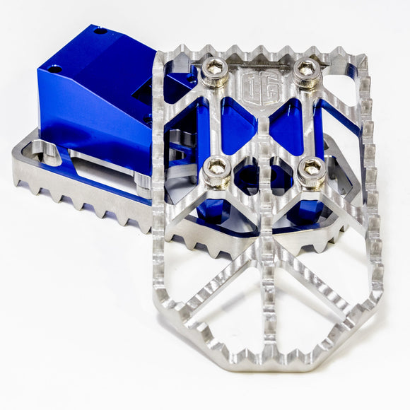 Blue anodized CNC aluminum motocross foot pegs with serrated grip