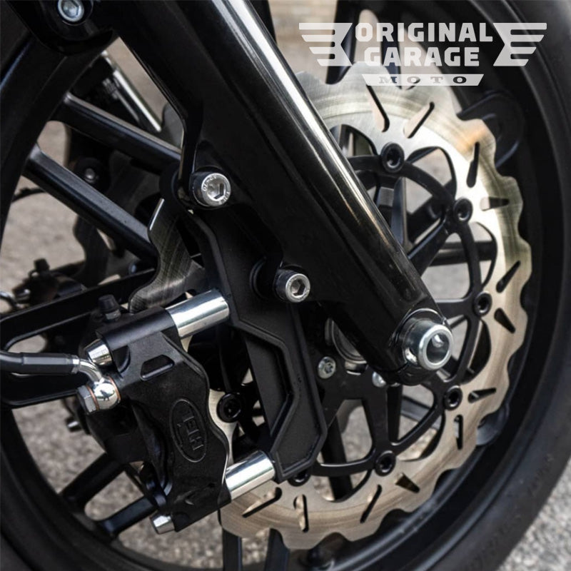 Radial-mount brake caliper bracket for motorcycle front disc rotor