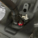 Bamco ARP stainless steel 12-point bolt and red anodized billet washer securing Harley-Davidson air-cooled 6-speed transmission oil return line.