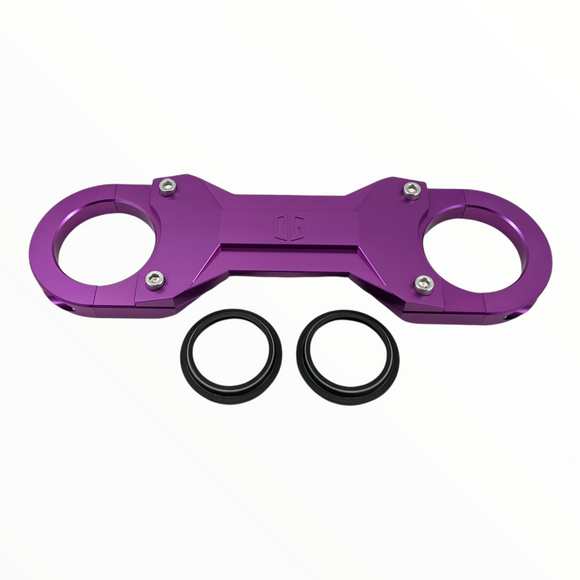 Purple anodized CNC motorcycle top triple clamp with two rubber fork seals
