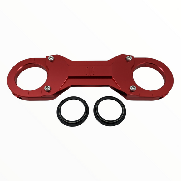 Red anodized aluminum motorcycle upper triple clamp with fork seals