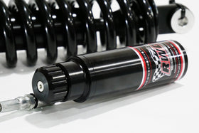 RWD V-Twin RS-1 shock absorber with remote reservoir, side view for 2018 Softail