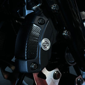 Close-up of BAMCO ARP stainless bolts installed on a Harley-Davidson Bagger, Touring Caliper Pinch Bolt ARP Kit