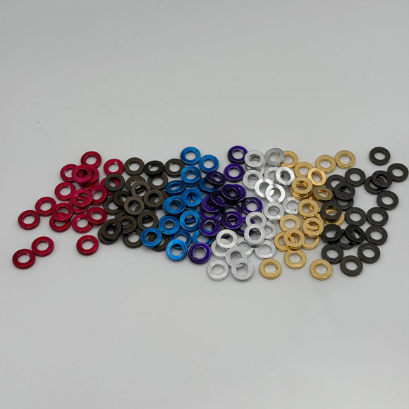Close-up of BAMCO M8 Engine & Transmission ARP Washer Kit, powder coated billet washers for Harley-Davidson M8