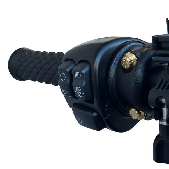 Close-up of Harley-Davidson handlebar control and grip with gold ARP stainless steel bolts by Bamco