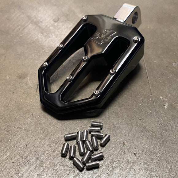 Black BMX/moto foot peg with pack of 16 stainless M4 x .7 x M8 replacement grip set screws