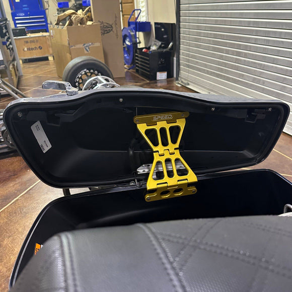 Speed by Design Billet Saddlebag Lid Tethers for Harley Davidson Touring Motorcycles in Gold installed on bike