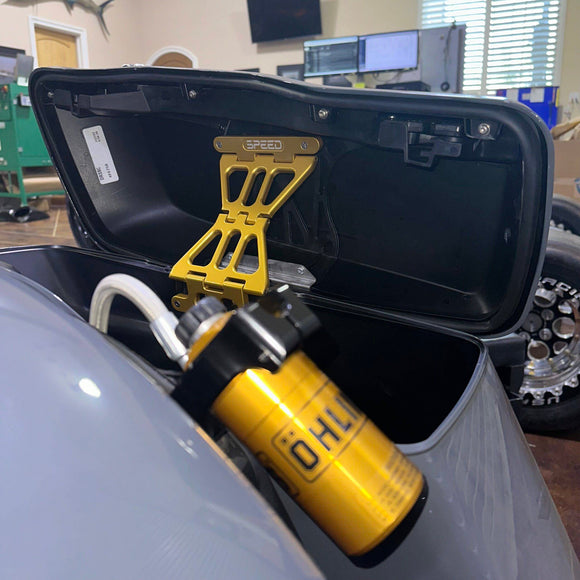 Speed by Design Billet Saddlebag Lid Tethers for Harley Davidson Touring Motorcycles in Gold installed on a motorcycle