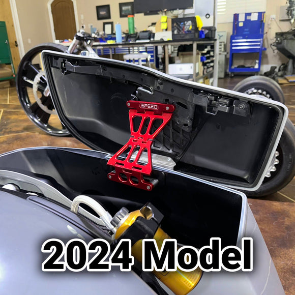 Speed by Design Billet Saddlebag Lid Tethers for Harley Davidson Touring Motorcycles in Red on a 2024 Harley Road Glide