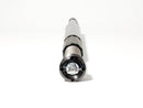 A close-up, eye-level shot of an RWD V-Twin RS-1F front fork cartridge, showcasing its black anodized cap with the RWD logo, silver spring, and gray body against a clean white background.