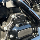 Close-up of the BAMCO Gear Position Sensor Cover - Gloss Black installed on a Harley-Davidson Harley