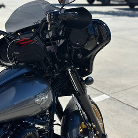 Close-up of Harley-Davidson Street Glide inner fairing featuring BAMCO ARP stainless steel gold-plated bolts