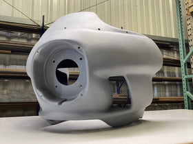 RWD V-Twin FXR batwing fairing with primed finish and mesh vent screen